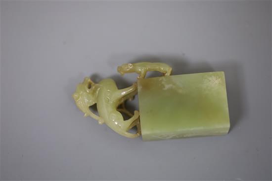 A Chinese greenish-yellow jade seal, 19th/20th century, H. 7.5cm